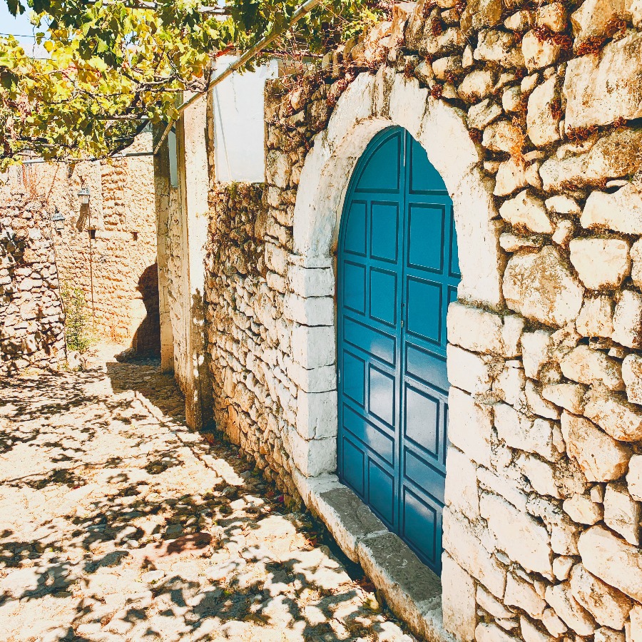 blue door at himara castle