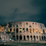 rome italy night time view of the colosseum